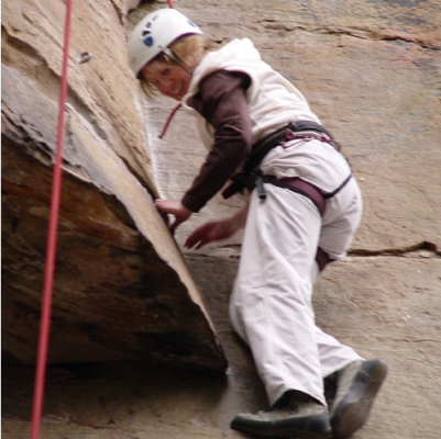 Yvonne rock climbing in Kentucky